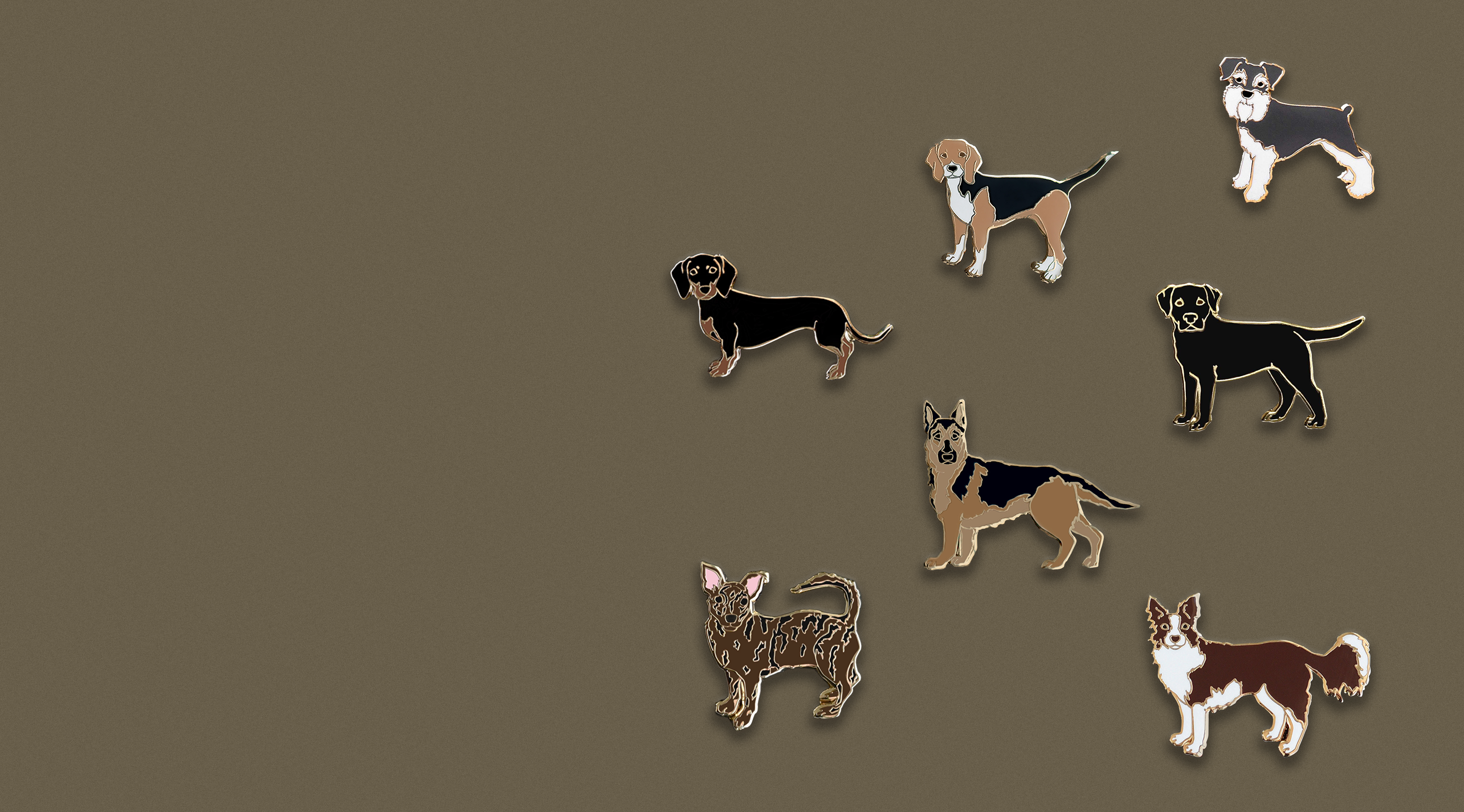 Set of dog pins on a brown background