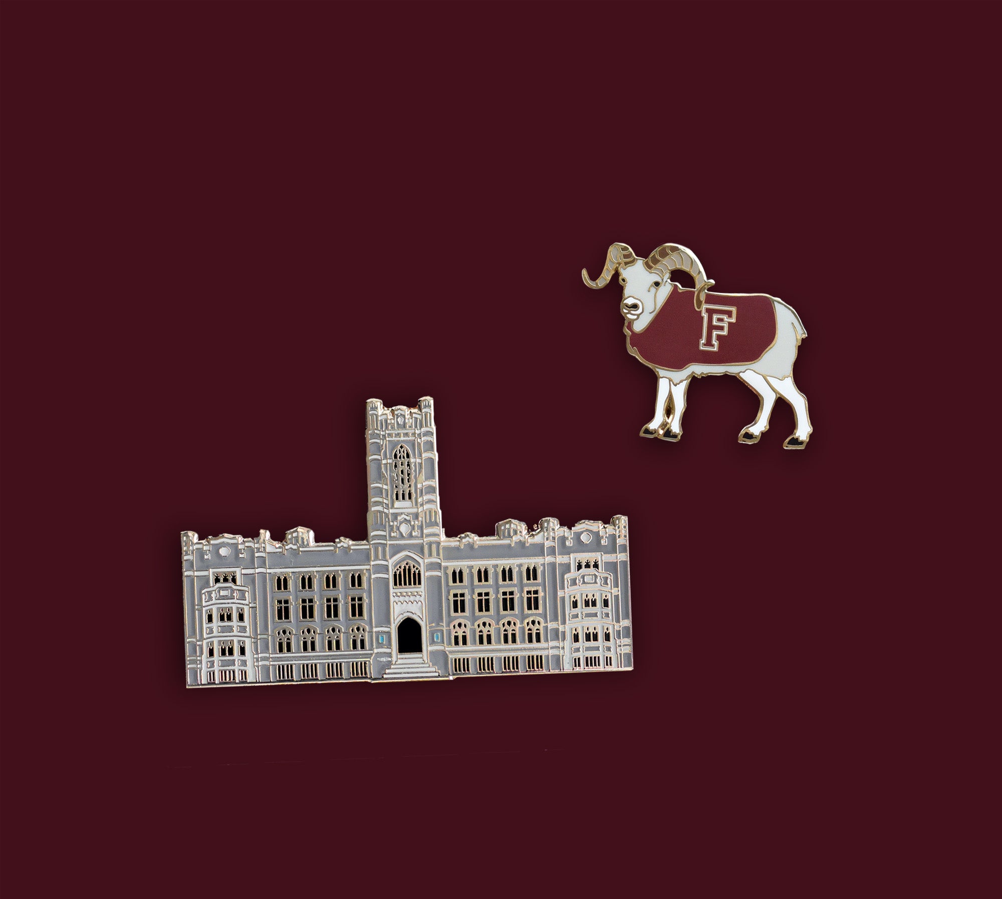 Fordham University Lapel Pins on a Maroon background. Ramses the Fordham Ram and Keating Hall